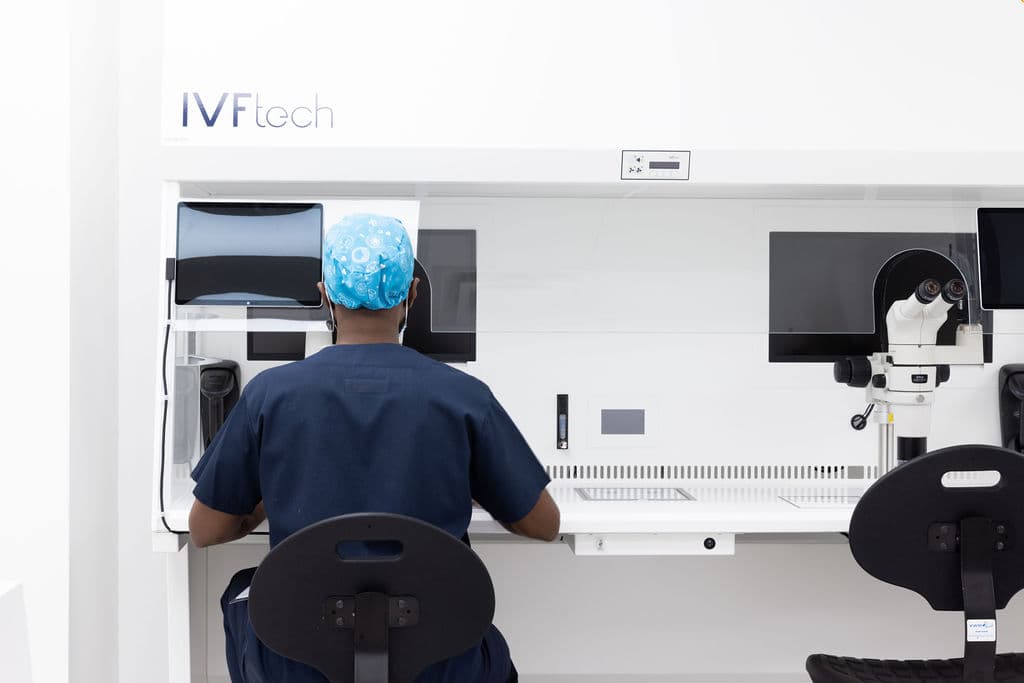 An embryologist working inside the Twig lab.